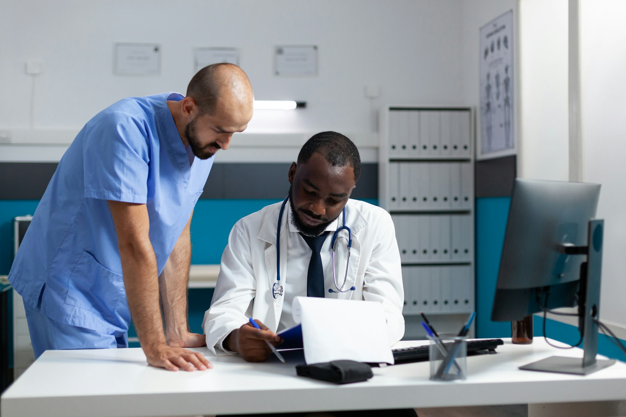 African american doctor analyzing pharmaceutical documents