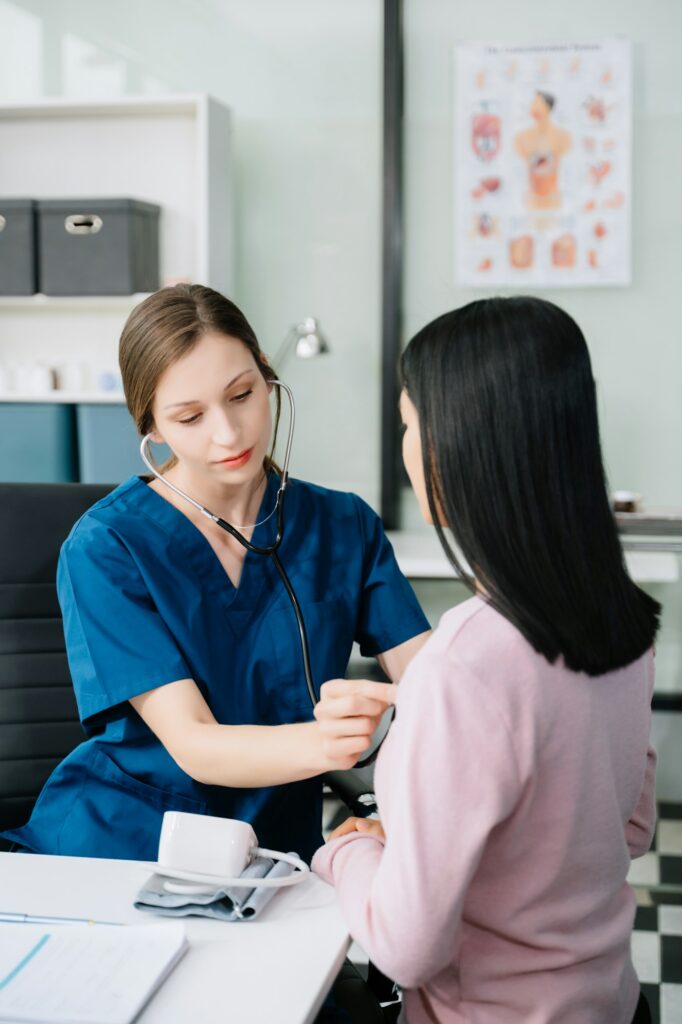 Portrait of female doctor explaining diagnosis to her patient. Doctor Meeting With Patient