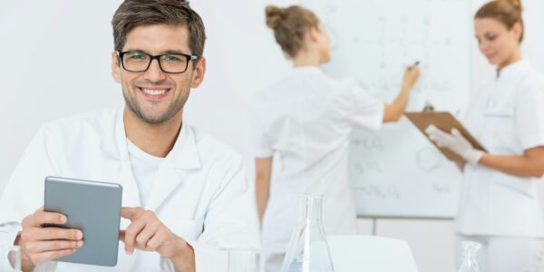 Young scientist recording his findings