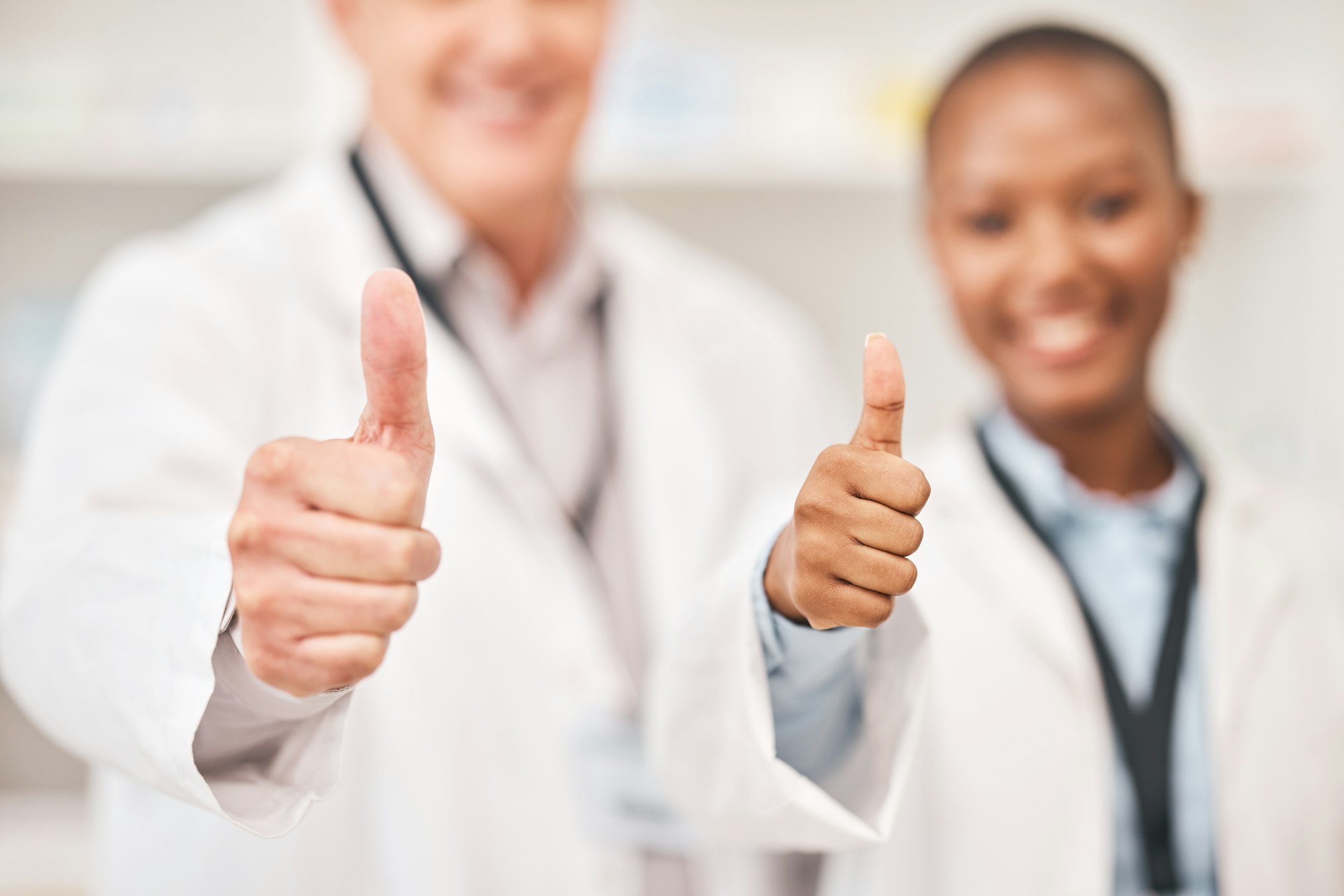 Pharmacist man, woman and thumbs up in shop, retail store or hospital for feedback, review or good