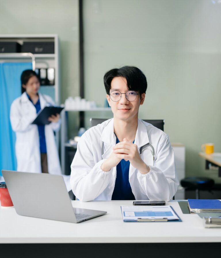 doctor-analyzing-patient-data-on-tablet-in-clinical-lab-medical-professional-in-hospital-e1732271617113-768x899