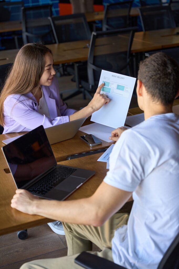 people-are-working-on-documentation-and-talking-682x1024