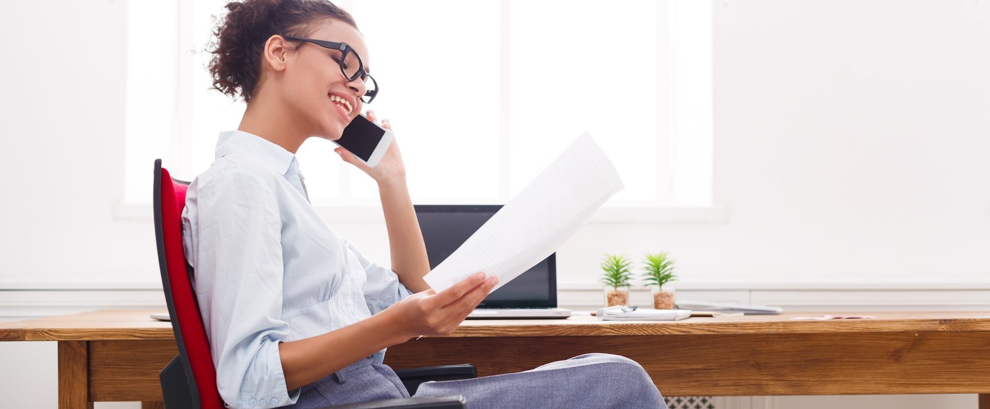 Business talk, woman consulting by phone at office